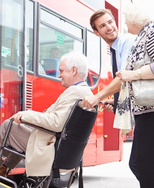 Wheelchair person getting on bus